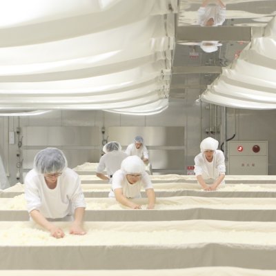 Workers at the Asahi Shunzo brewery